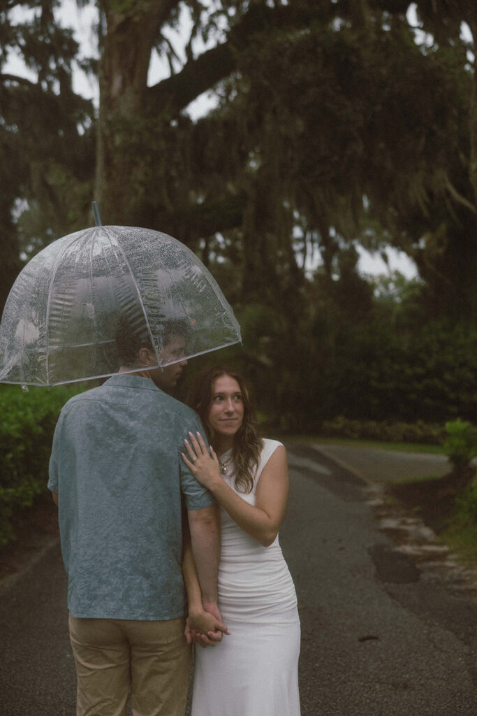 Newly engaged, couple playing during their photoshoot