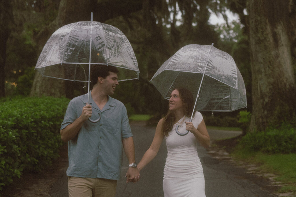 Cute picture of the newly engaged couple smiling at each other