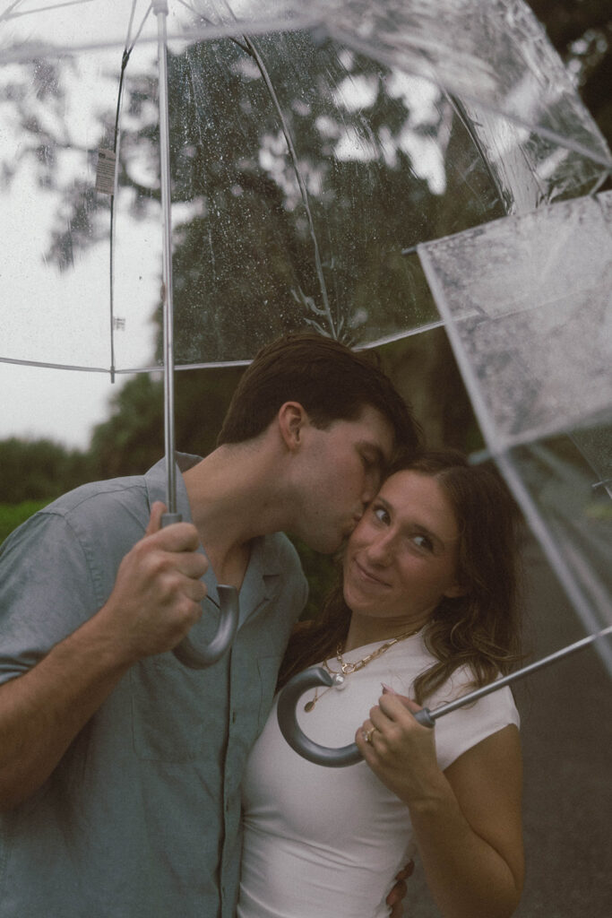 Fiancé, kissing his fiancé on the cheek