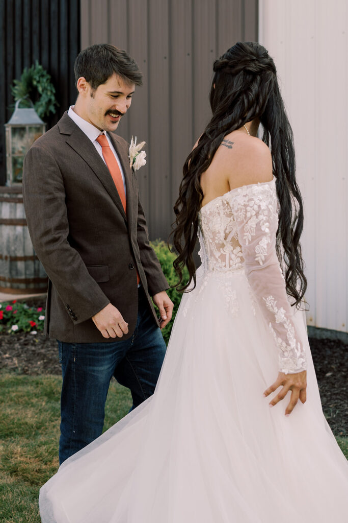 bride and groom emotional at their first look
