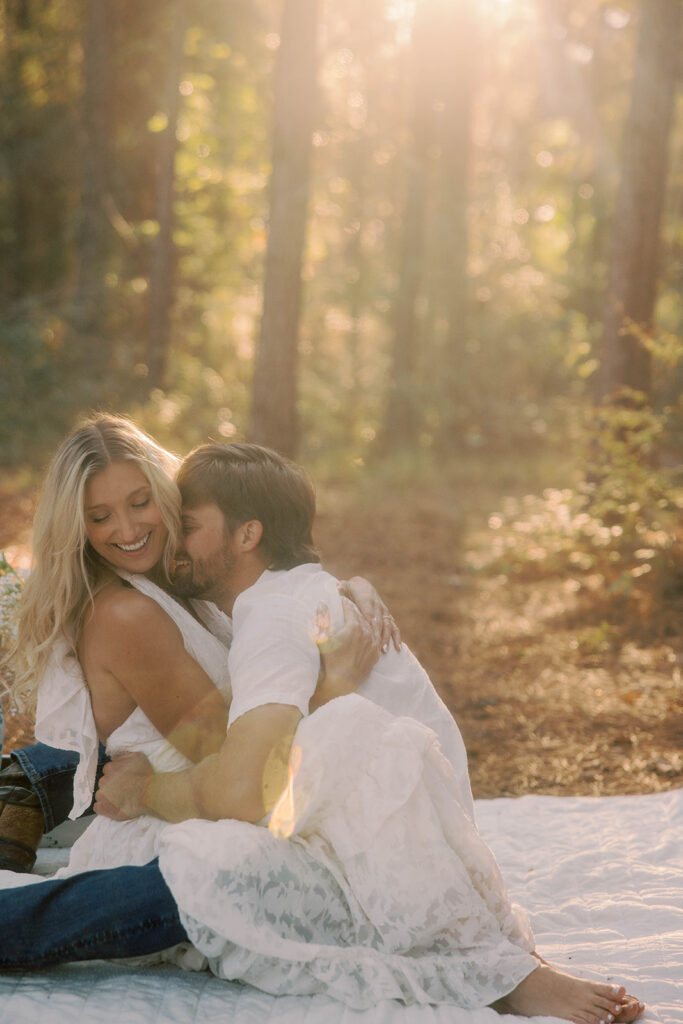 fiance kissing his fiance on the cheek