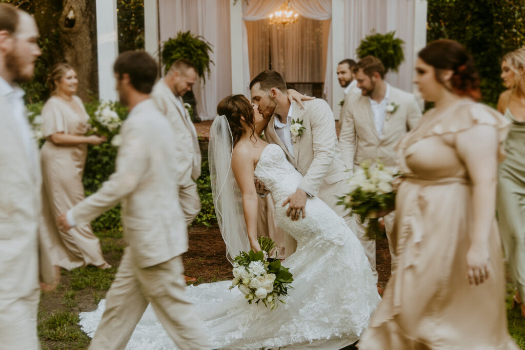 couple at their fun wedding party photos