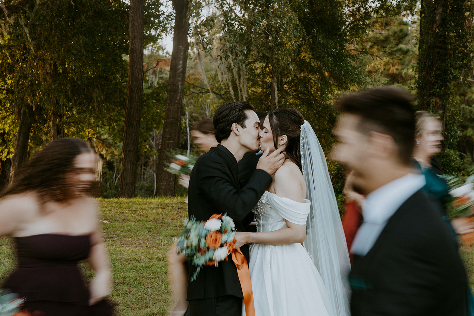Cute picture of the bride and groom with their bridal parties