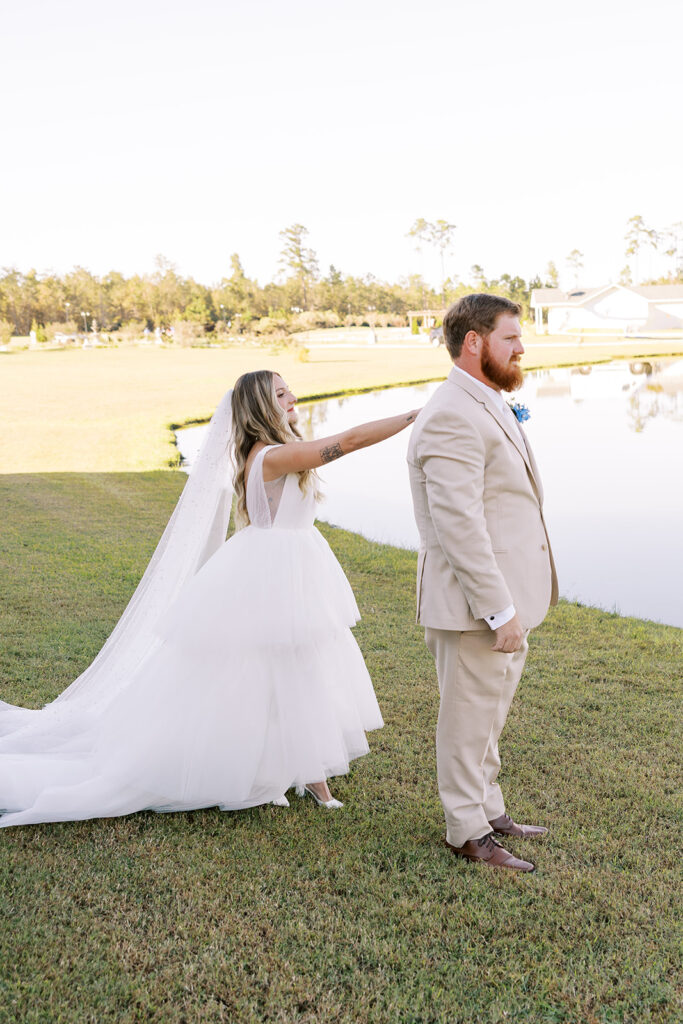 cute picture of the bride and groom at their first look