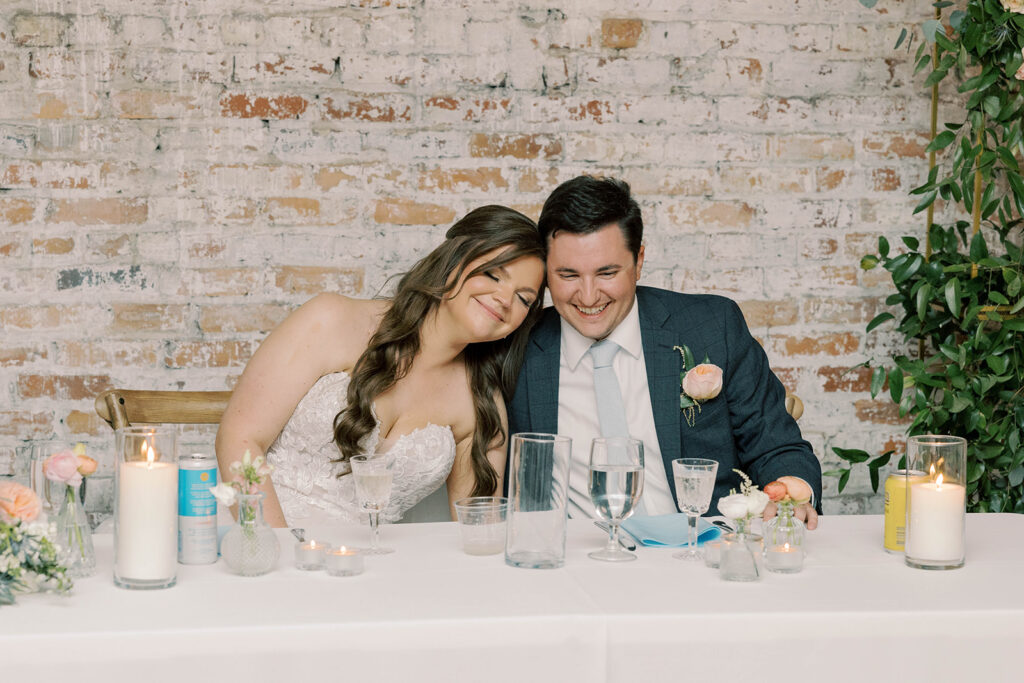 cute picture of the newlyweds at their wedding reception