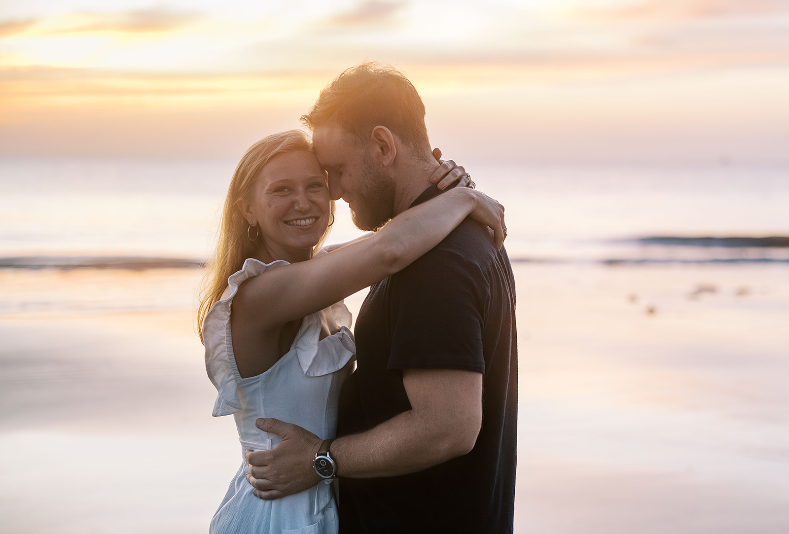 A Playful Sunrise Engagement at Driftwood Beach on Jekyll Island