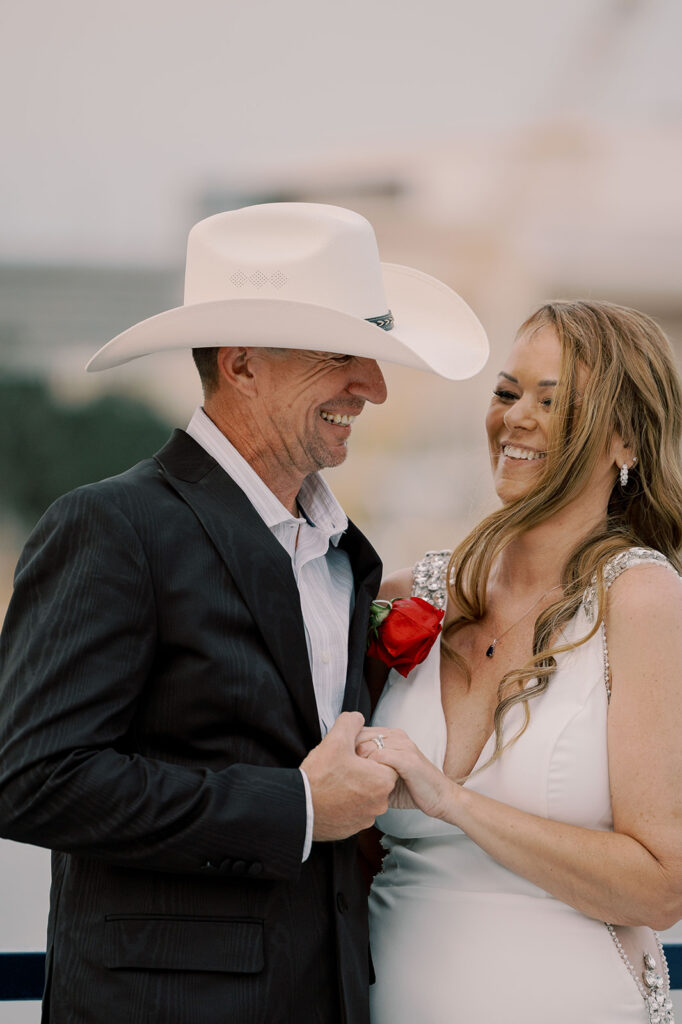 cute couple laughing during their bridal portraits