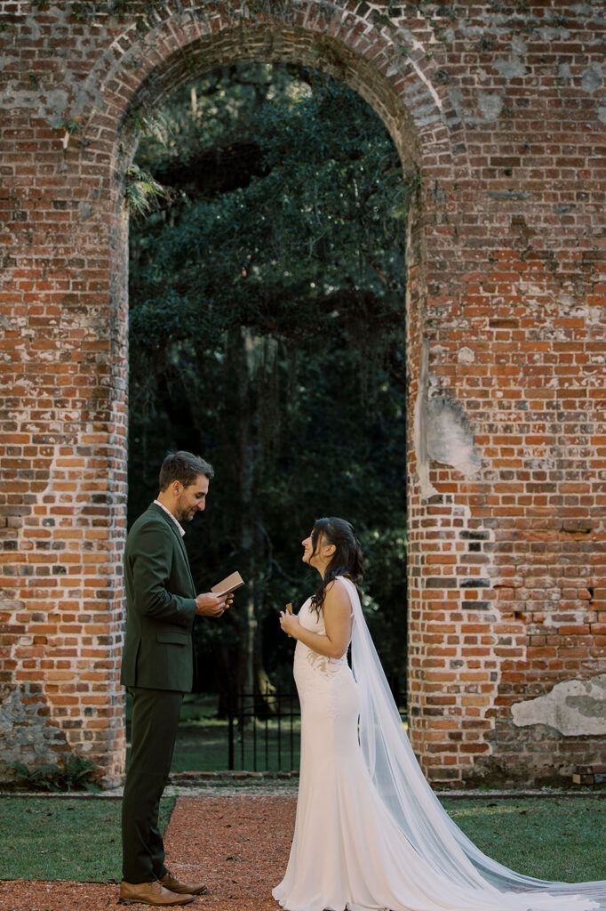 Bride and groom, reading their vows
