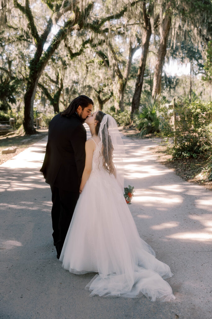 Cute picture of the bride and groom holding hands