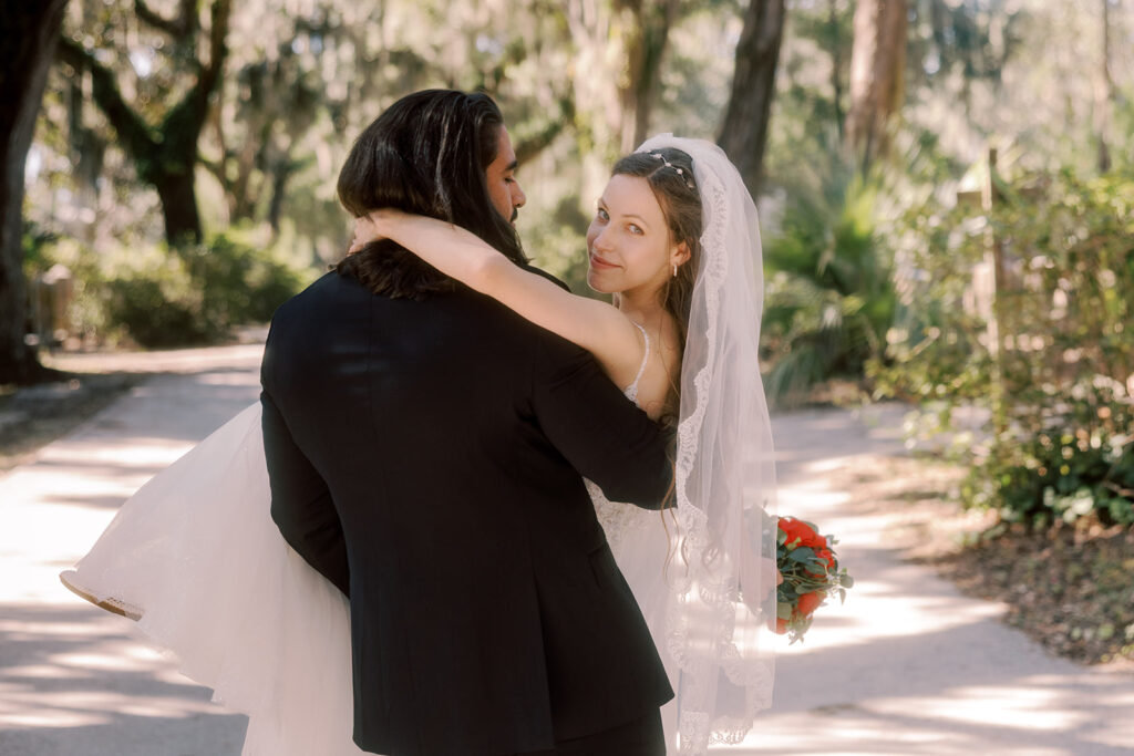 Bride and groom dancing during their bridal portraits