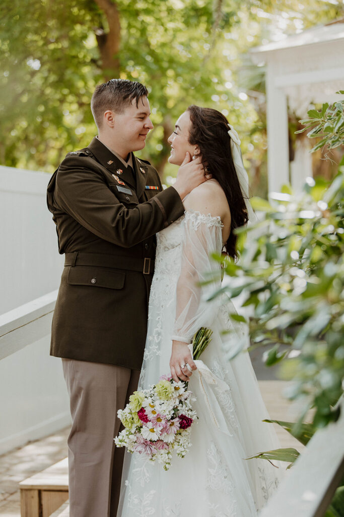 Portrait of the bride and groom, smiling at each other