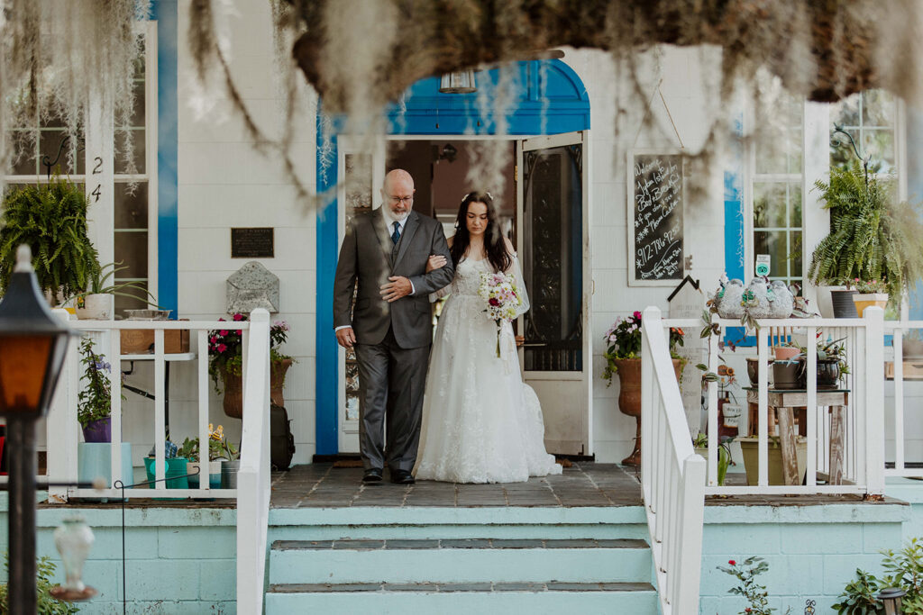 Stunning portrait of the bride walking down the aisle