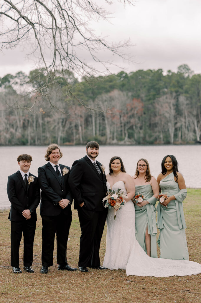 cute picture of the bride and groom with their friends