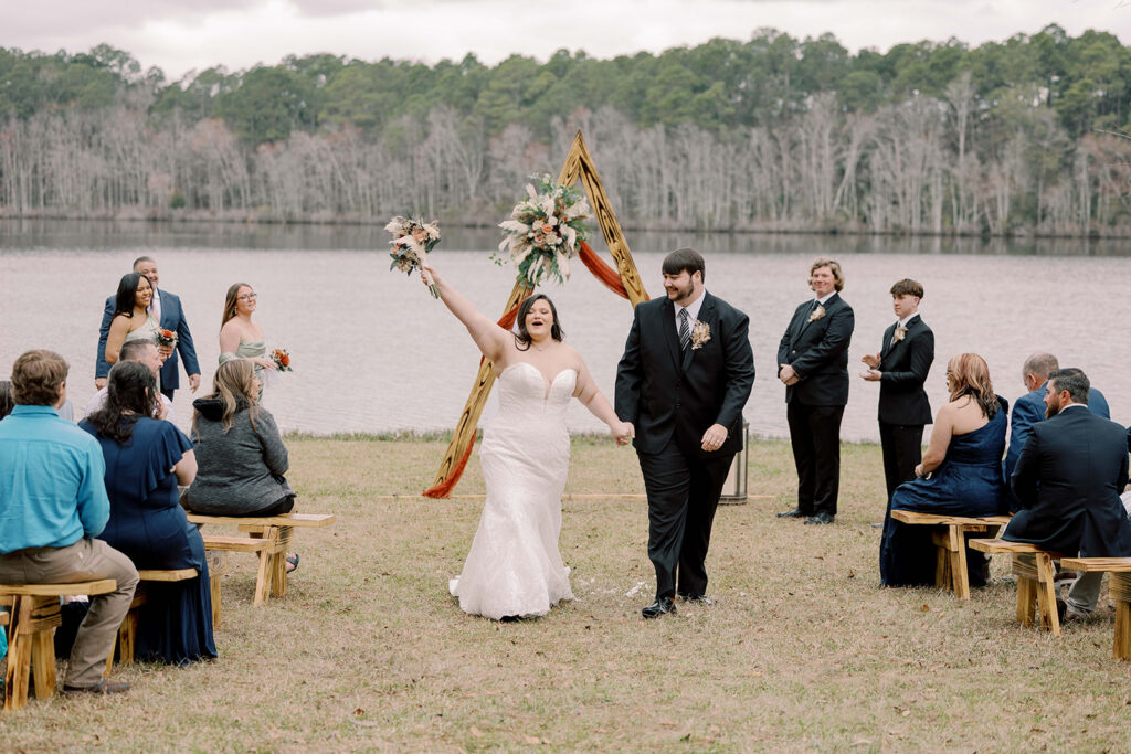 cute picture of the newlyweds heading to their reception