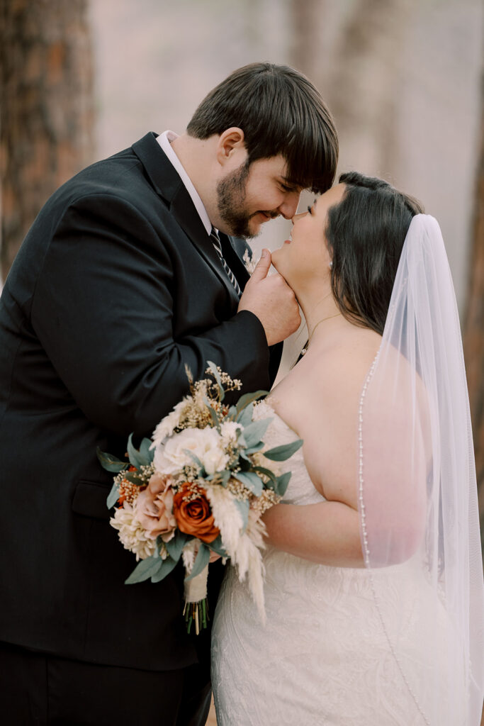 picture of the bride and groom smiling at each other