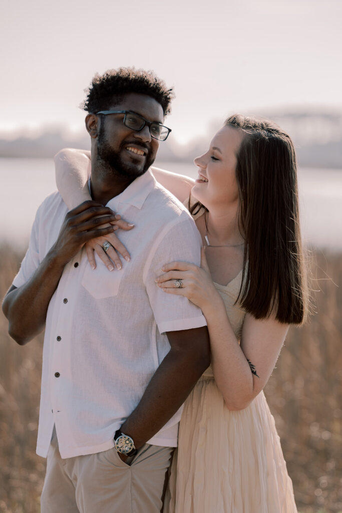 couple laughing with each other during their photoshoot