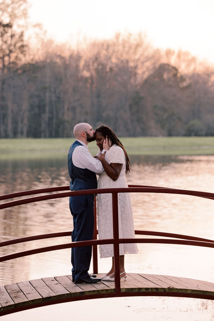 Fiancé, kissing his fiancé on the forehead