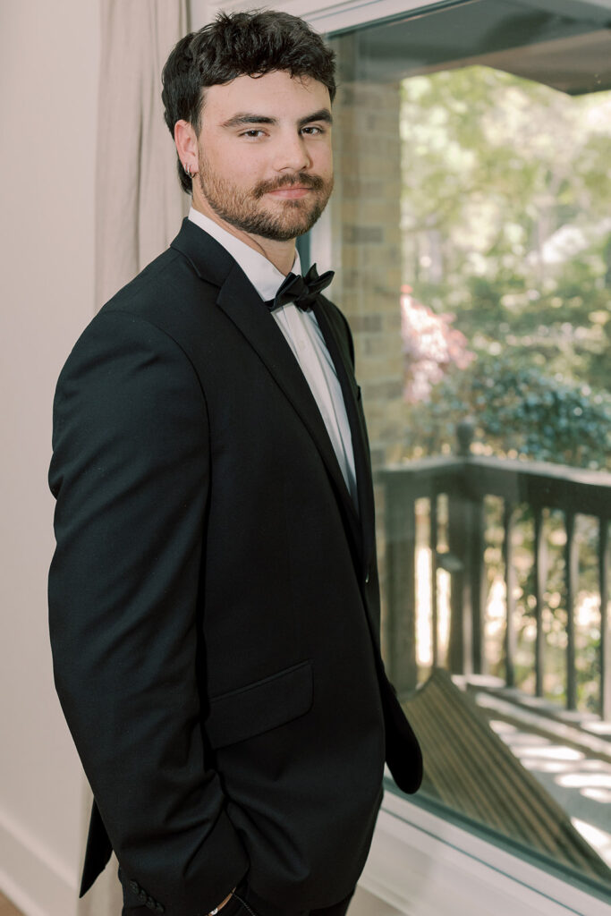 groom before his first look with the bride