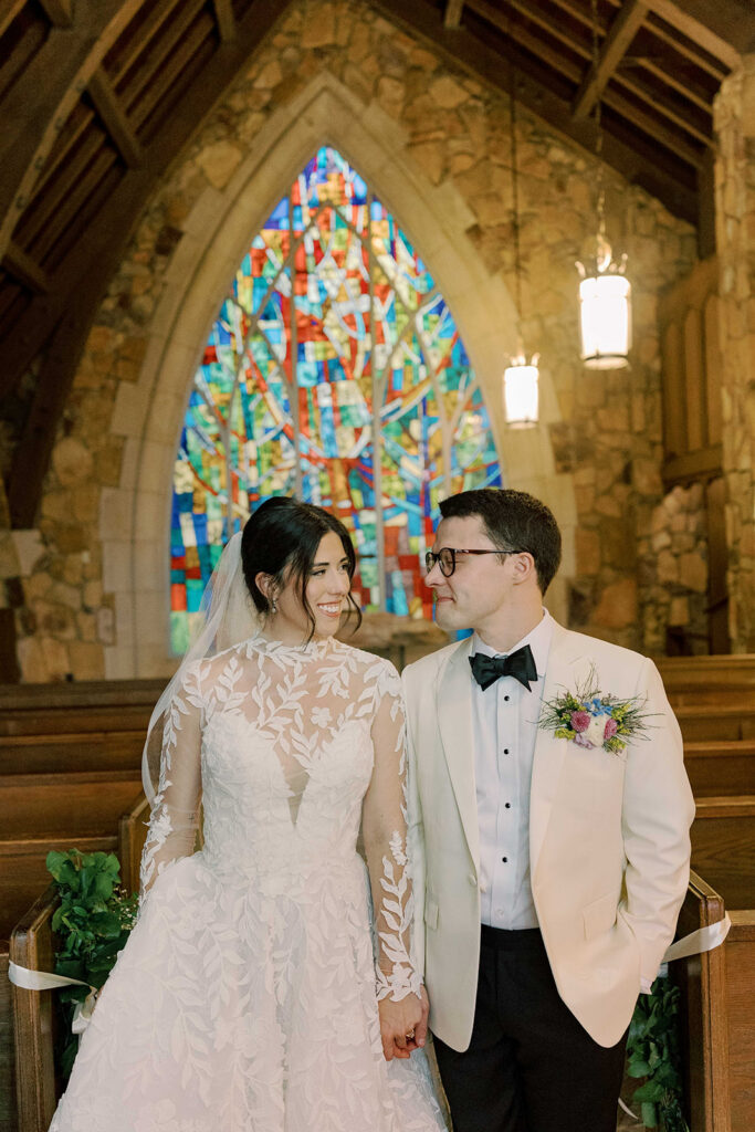 cute picture of the bride and groom smiling at each other