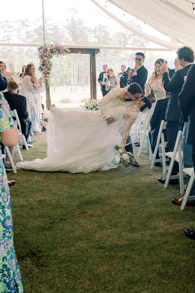 cute picture of the newlyweds kissing
