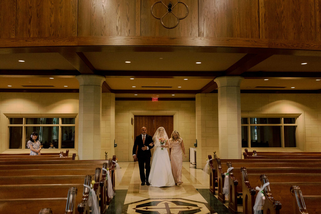 cute picture of the bride walking down the aisle