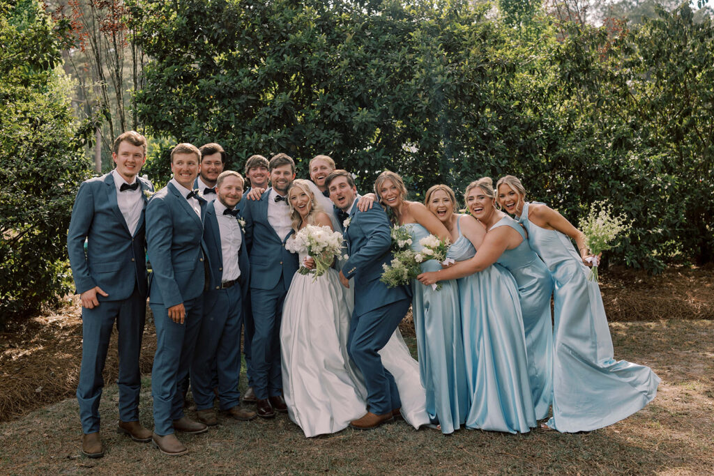 cute picture of the bride and groom with their friends