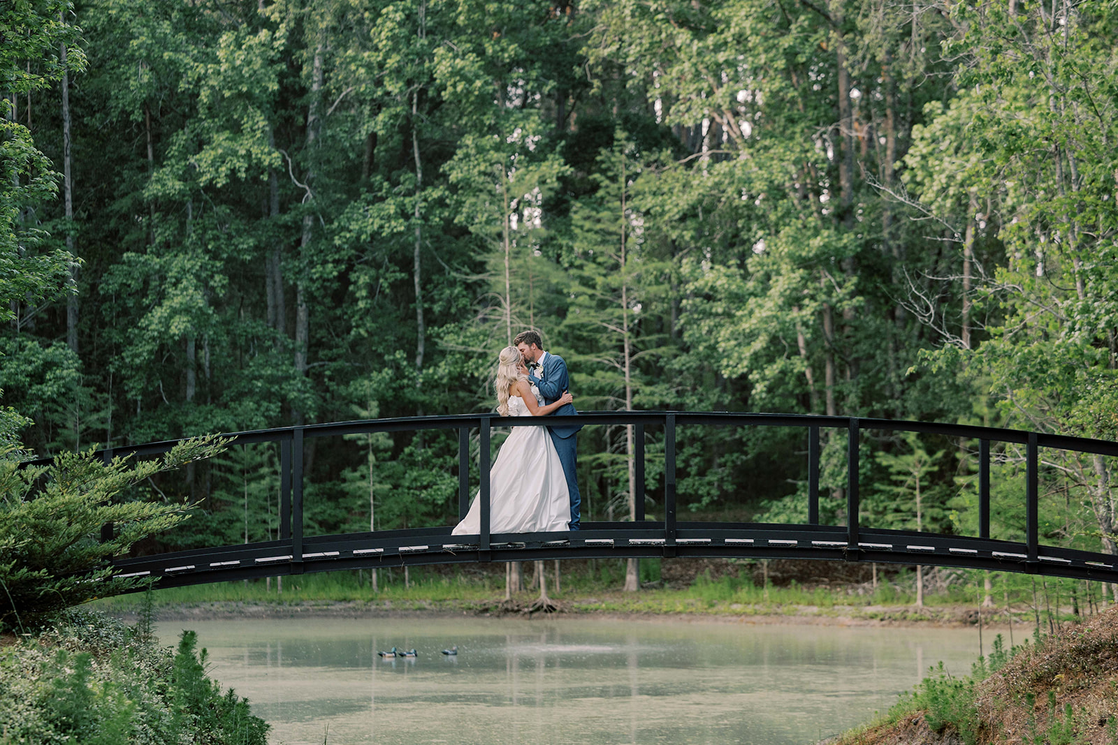 stunning picture of the newlyweds kissing