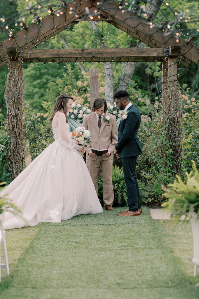 bride and groom emotional during their wedding ceremony