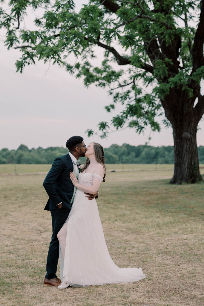 cute picture of the newlyweds kissing