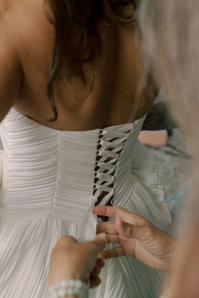 bride getting ready for her intimate wedding ceremony
