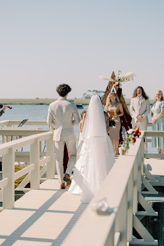 Intimate Tybee Island Elopement with Family on a Private Waterfront Dock