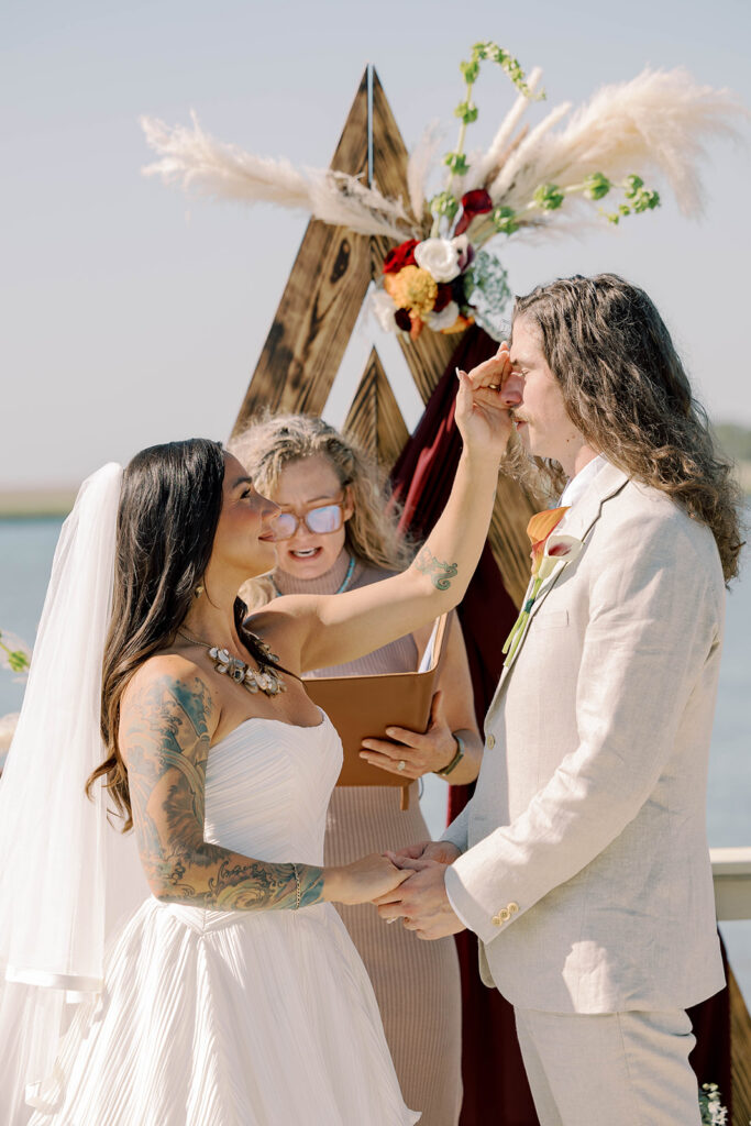 bride and groom emotional during their ceremony