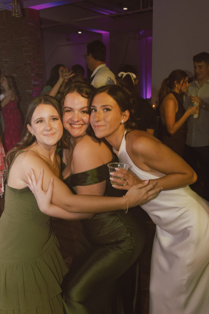 bride having the best time at her wedding reception party