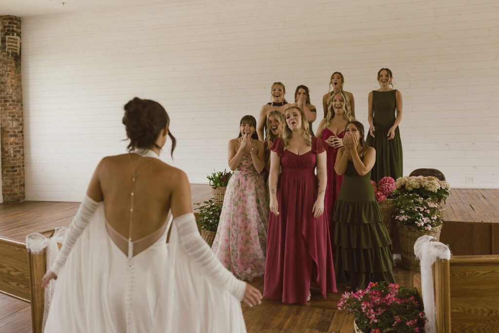 first look of the bride with her bridesmaids