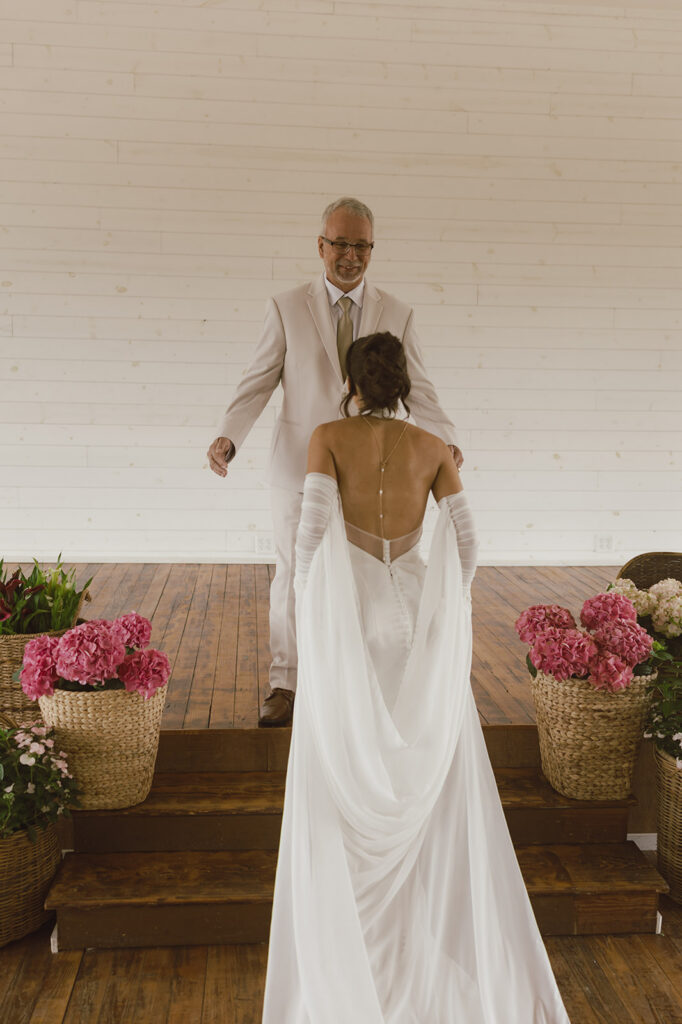 first look of the bride and her dad