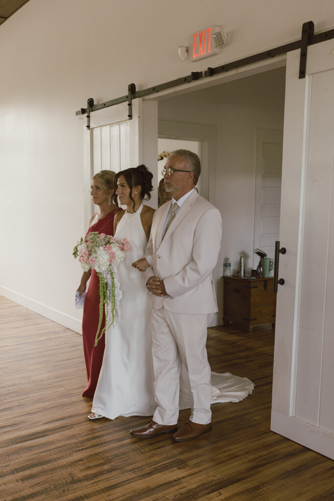 beautiful picture of the bride walking down the aisle