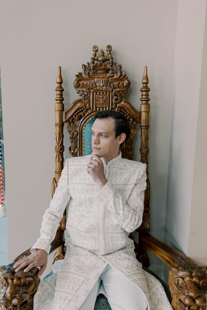 portrait of the groom before his first look with the bride