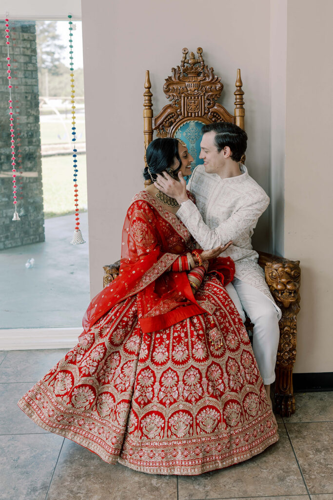 cute picture of the bride and groom laughing with each other