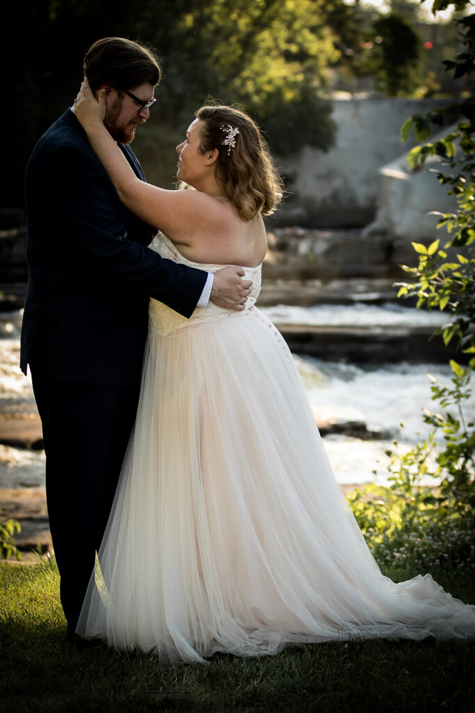 Cute picture of the bride and groom smiling at each other