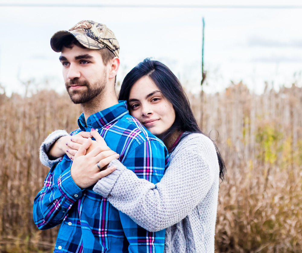 Couple hugging during their photoshoot
