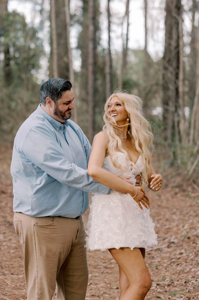 couple laughing with each other during their session
