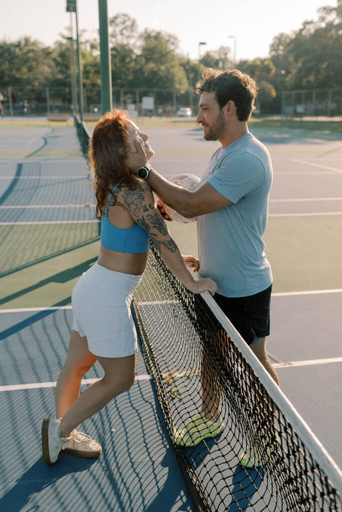 couple at their playful engagement portraits