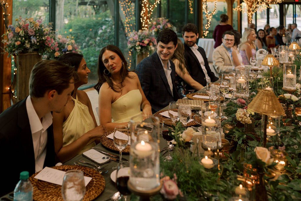 portrait of the bride and groom with their guests