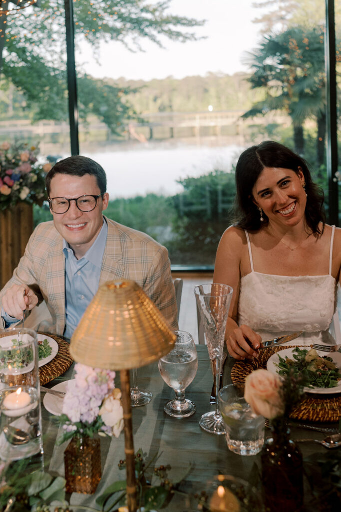 cute picture of the bride and groom laughing with each other