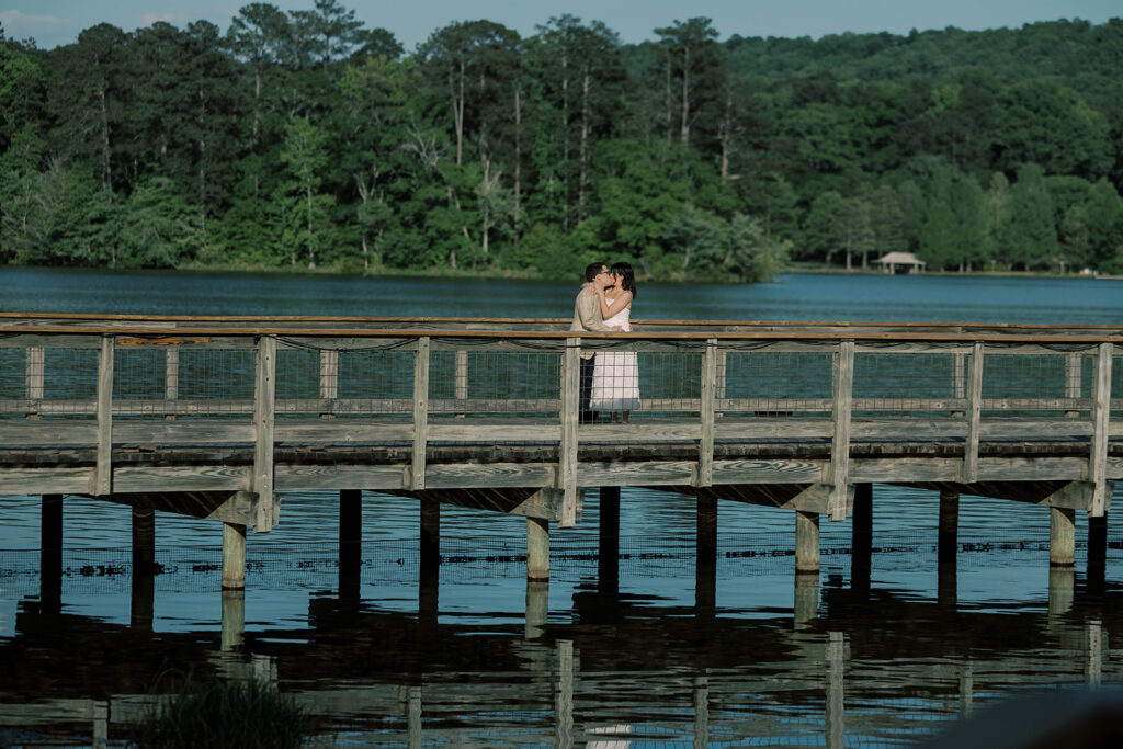 cute picture of the bride and groom kissing