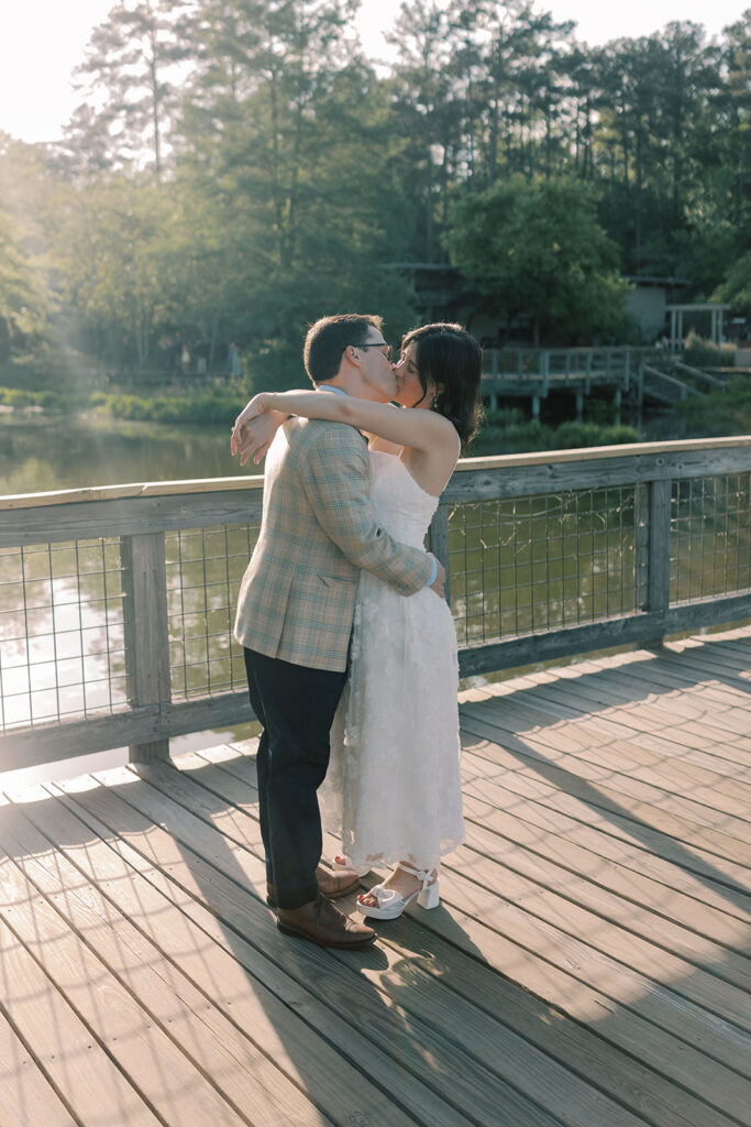 cute picture of the bride and groom kissing