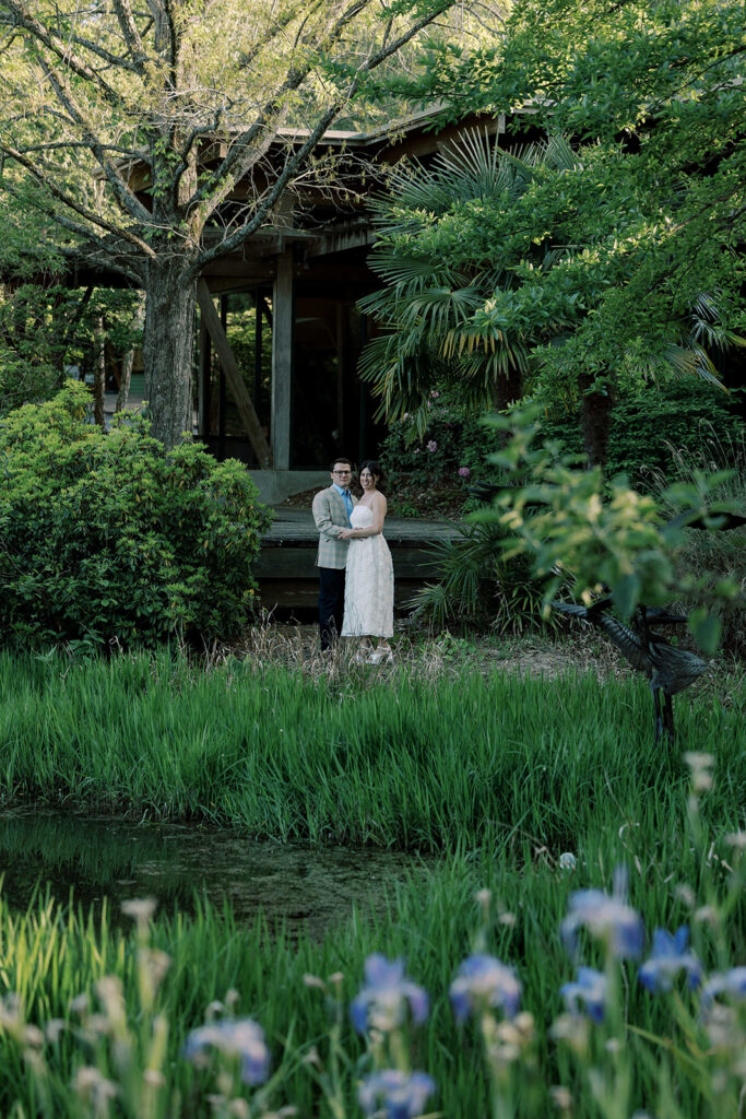 cute picture of the bride and groom smiling at the camera