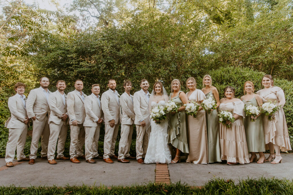 newlyweds with their bridal parties