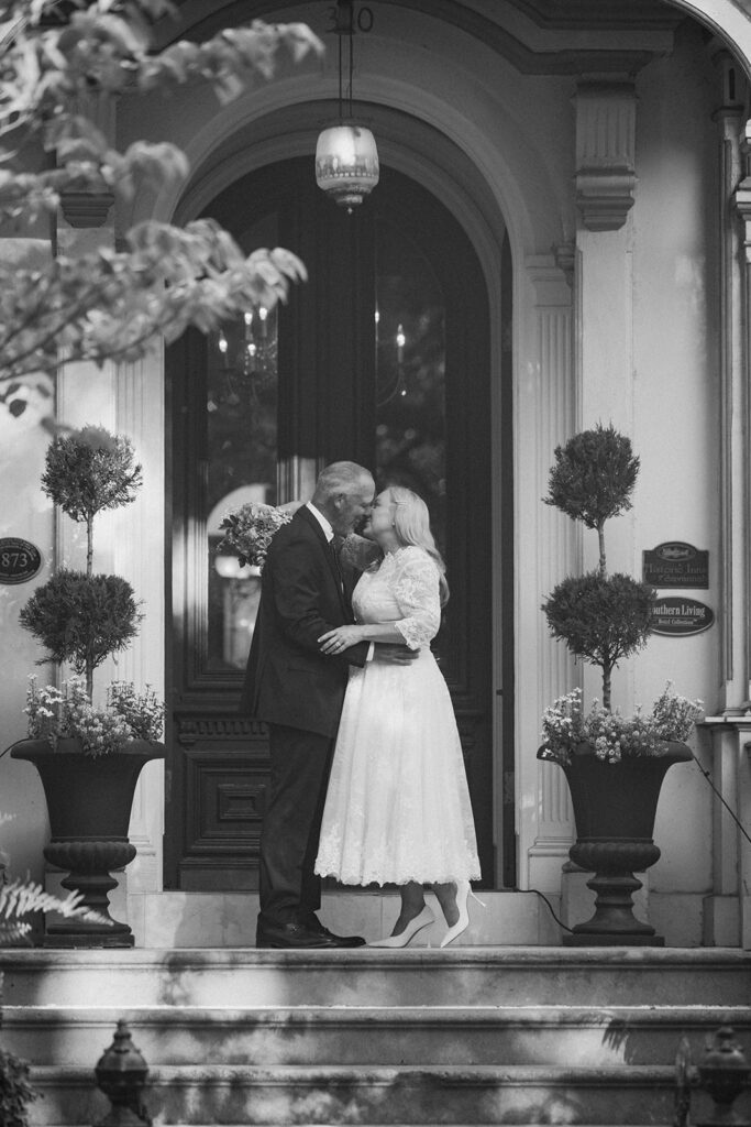 cute picture of the bride and groom kissing
