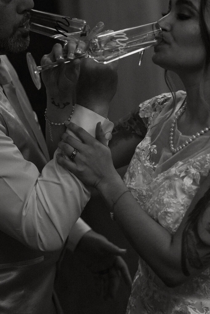 newlyweds celebrating their wedding day with champagne